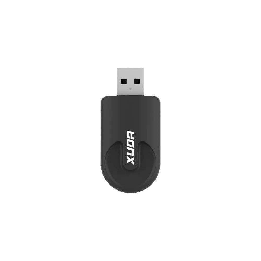 Small black rectangular CarPlay USB wireless adapter dongle on a white background.
