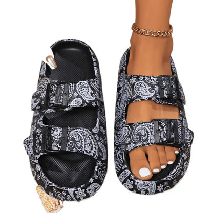 Women's thick bottom EVA slippers in leopard print and paisley patterns for bathroom use.