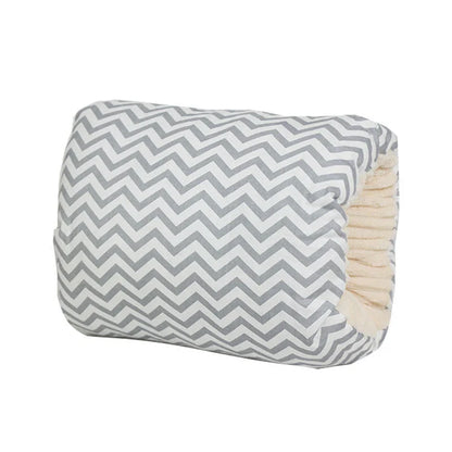 Adjustable cotton nursing pillow with various colorful designs, providing comfort and support for breastfeeding and bottle-feeding