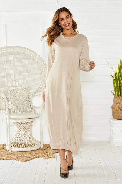 Black lantern dress with lace-up crew neck and loose fit, made from knitted polyester fabric