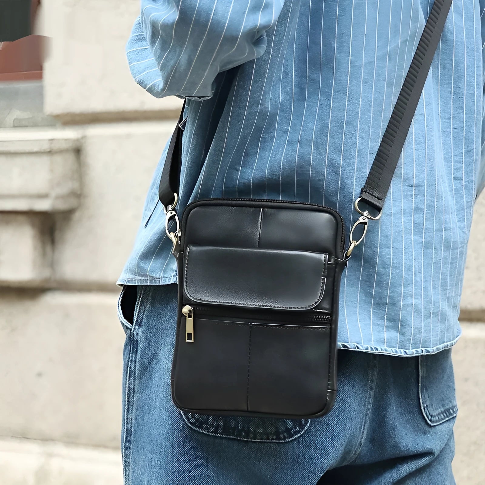 Men's brown leather crossbody shoulder bag with visible stitching and polyester cotton lining