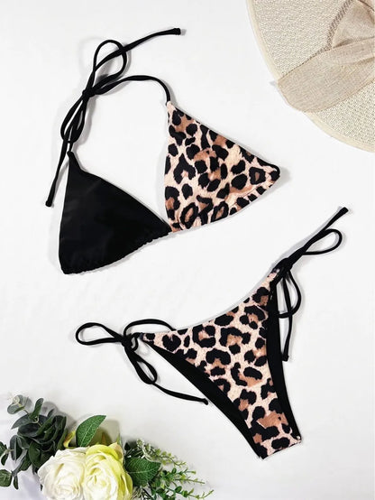 Women's leopard print halter bikini with lace-up ties and split leg swim bottoms