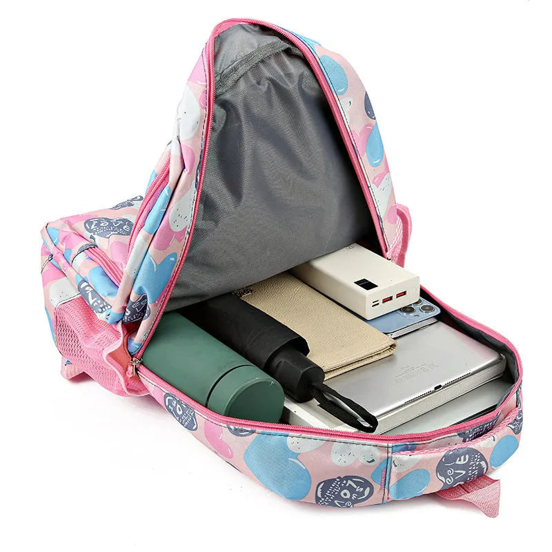 Student schoolbag with air pillow belt in blue, grey, pink, or rose red, made from Oxford cloth for burden reduction.