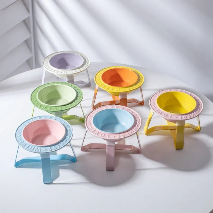 Ceramic cat bowl with iron anti-tip frame in blue colour with silicone pad