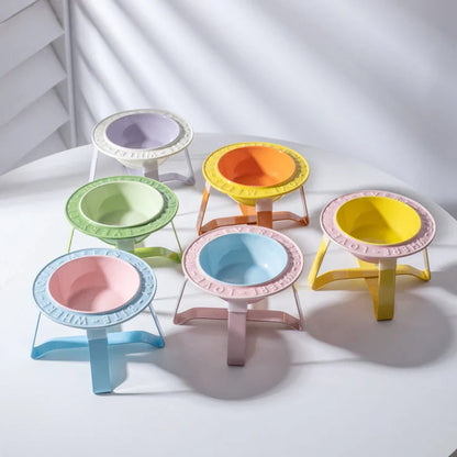 Ceramic cat bowl with iron anti-tip frame in blue colour with silicone pad