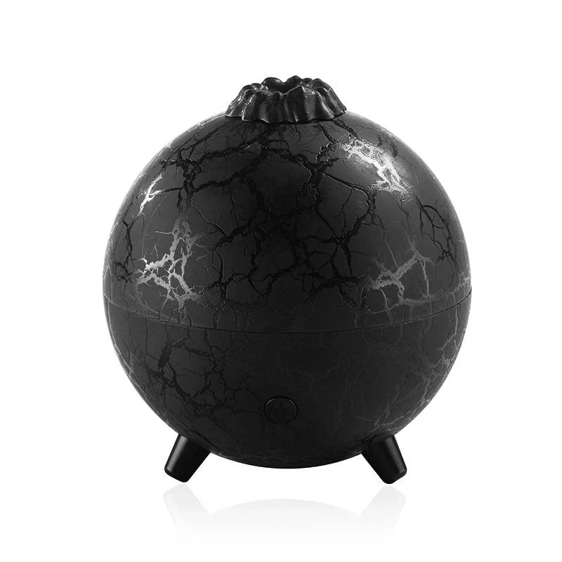 Stylish USB humidifier with essential oil diffuser, color-changing lights, and compact design for home or office use