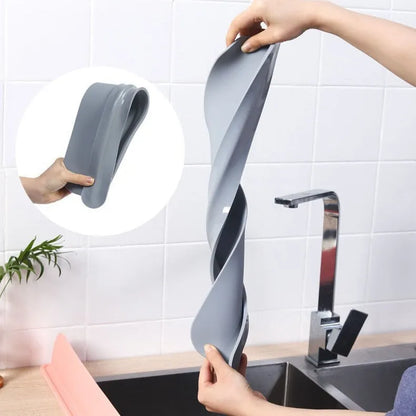 Grey silicone sink water blocking plate showing 52mm height and 85mm length dimensions