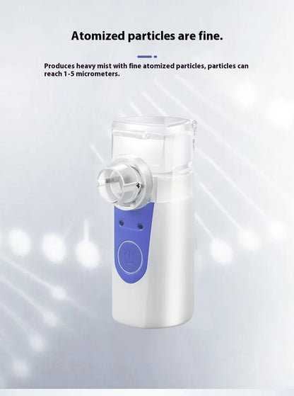 A white columnar handheld USB nebuliser spray machine with a single mist outlet on a table.