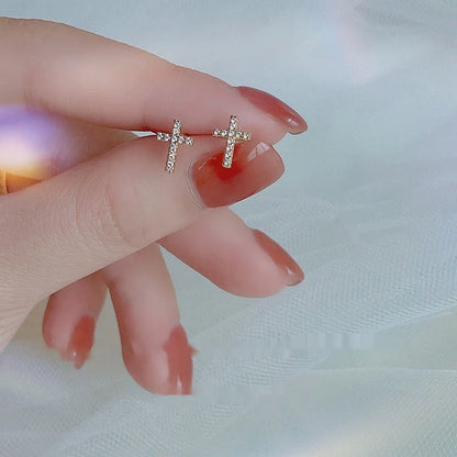 Stainless steel cross earrings with zircon inlay in white gold and gold finishes