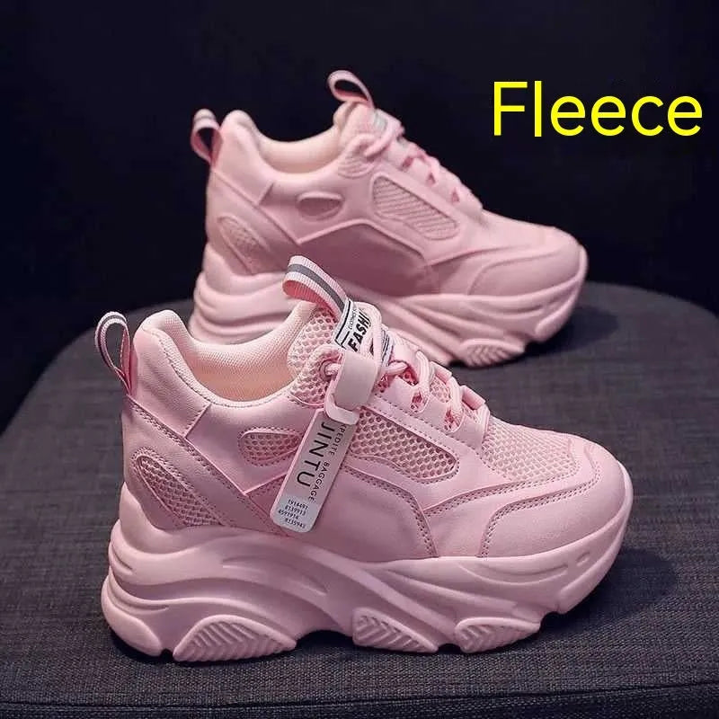 Women's black mesh platform casual shoes with hollow-out design detail on white background