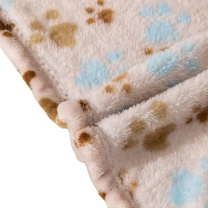 Blue dog cartoon print double-sided flannel pet blanket shown in a dog crate.