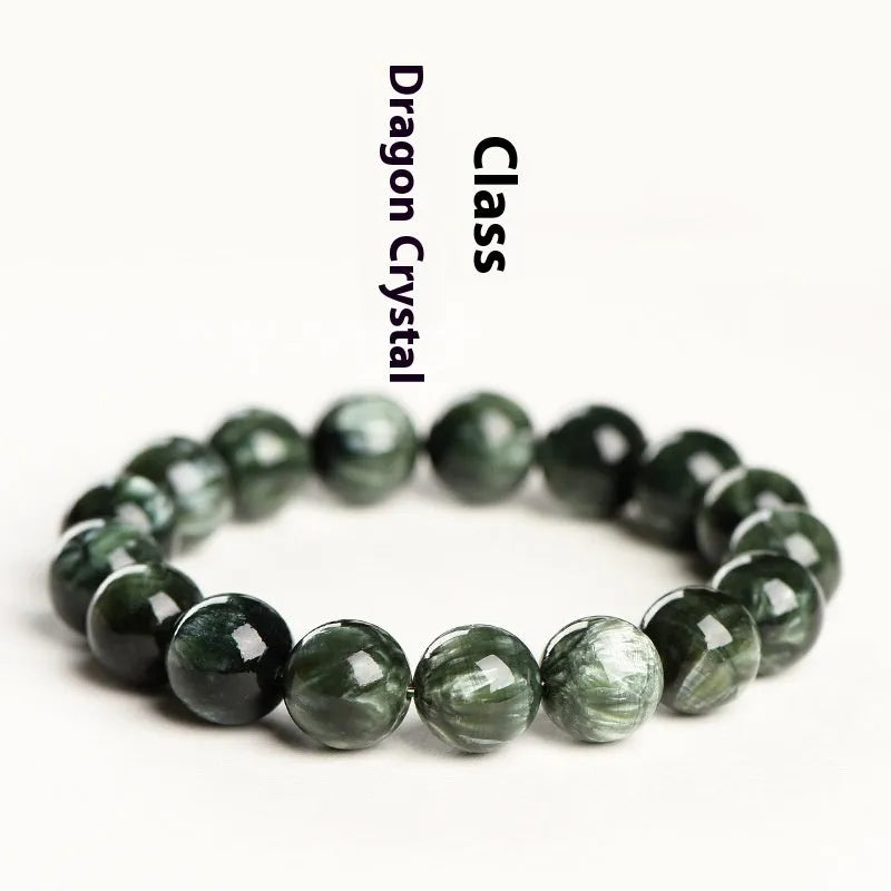 Green Dragon Crystal bracelet with 8-9mm geometry beads and Ruyi elements on wrist