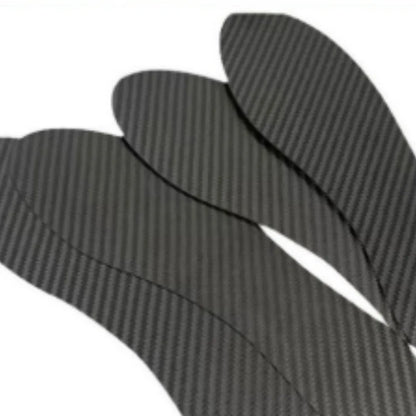 A pair of flat, black 3K full palm carbon fibre running insoles showing the textured weave.