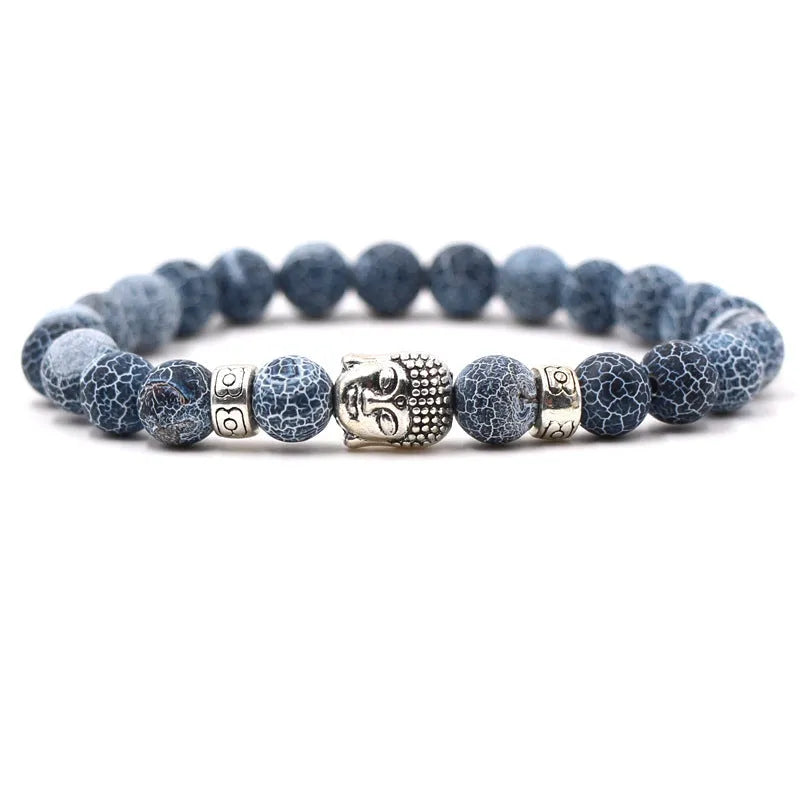Natural stone stretch bracelet with round beads in various colours including Tigereye and turquoise.