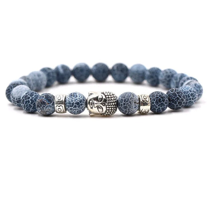 Natural stone stretch bracelet with round beads in various colours including Tigereye and turquoise.