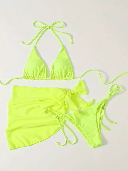 Women's three-piece mesh bikini swimsuit in vibrant colors, featuring a top, shorts, and skirt for versatile beachwear.