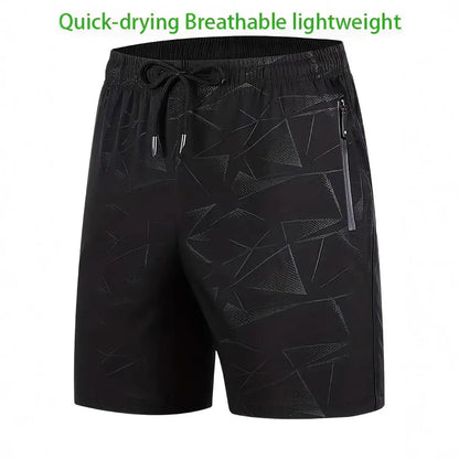 Men's loose-fit casual sports shorts in grey with a printed pattern, showing elastic waistband and fifth-pants length.