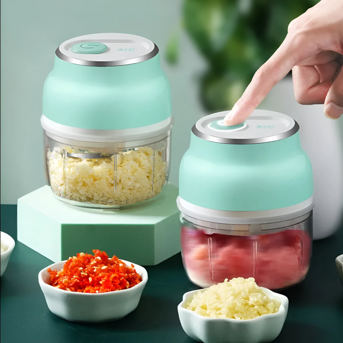 A portable electric garlic and food chopper with a transparent cup and stainless steel blade, showing 150ml and 230ml size options.