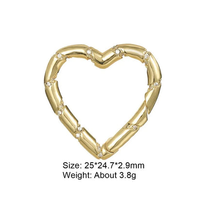 Copper heart-shaped climbing button with gold plating and zircon detail, measuring 1.5cm