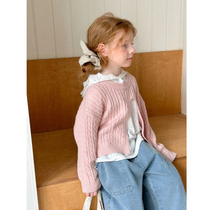 Girls' cotton knitted pullover in lotus root colour with single-breasted placket, shown on hanger