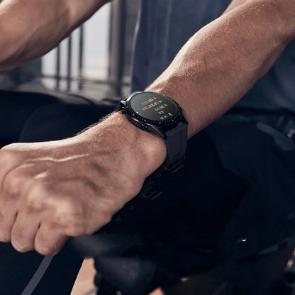 Round smartwatch with aluminium alloy case on wrist, showing interface with heart rate data.
