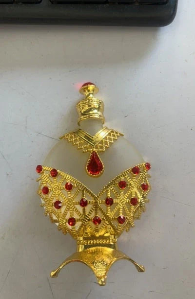 Luxurious Perfume Oil with Long-Lasting, Subtle Fragrance in Decorative Glass Bottle