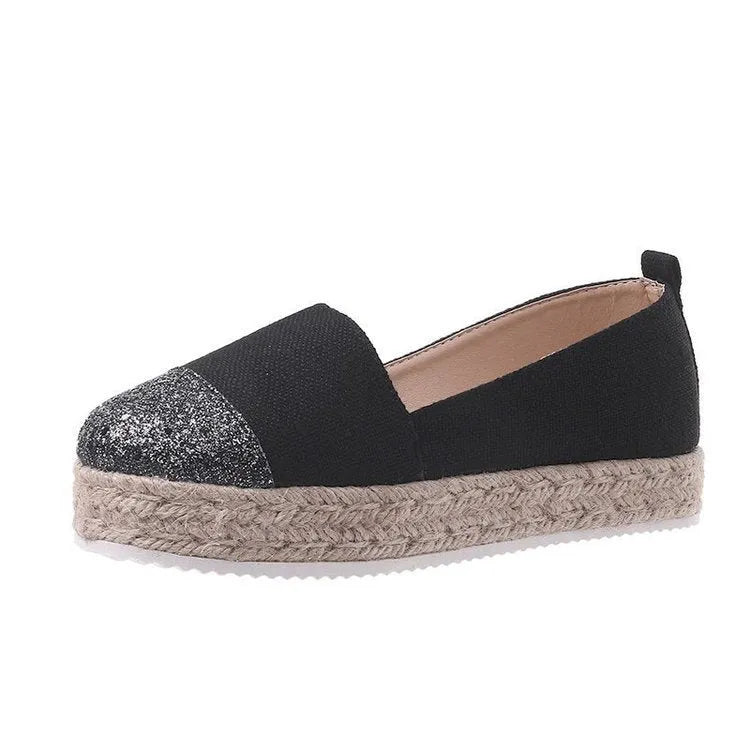 Breathable canvas slip-on flat shoes in black and white colours on a size chart showing 35 to 43.