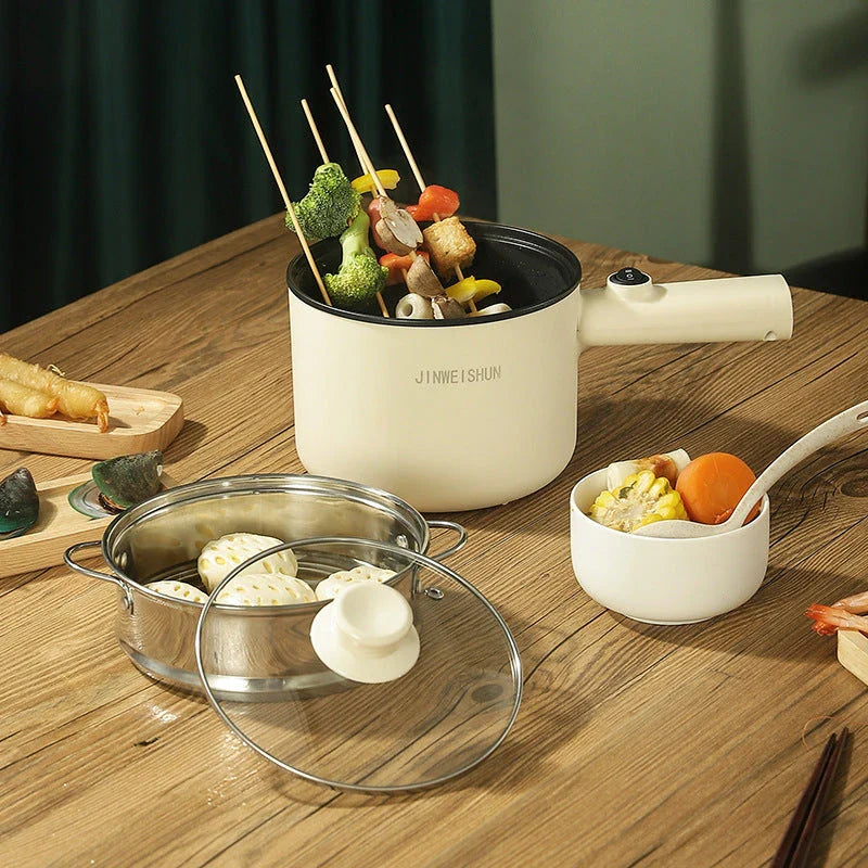 Versatile electric hot pot with stainless steel construction and non-stick interior for easy cooking and cleaning