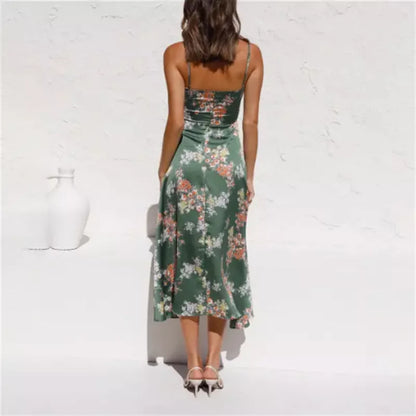 Women's sleeveless beach dress with flower print and hollow bowknot design