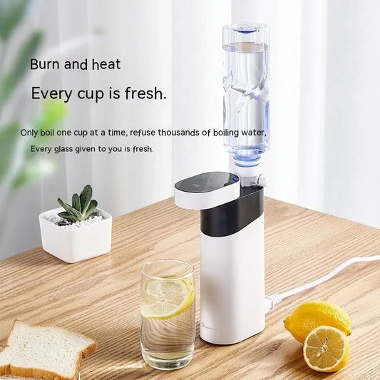 Black or green desktop instant water dispenser with 1600W power and under 1 litre tank capacity