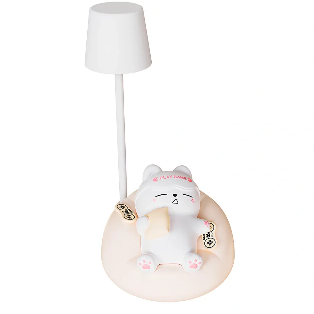 Sleeping cat shaped night lamp with USB charging port and soft LED illumination