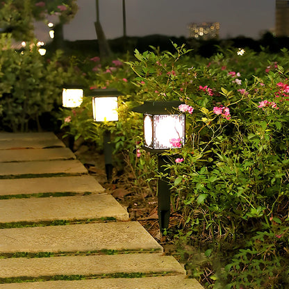 Square solar garden light with LED illumination for outdoor pathways