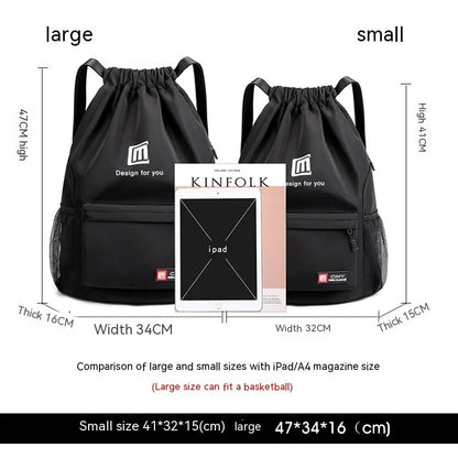 Large bucket-shaped travel backpack in blue with drawstring closure and soft black shoulder straps.