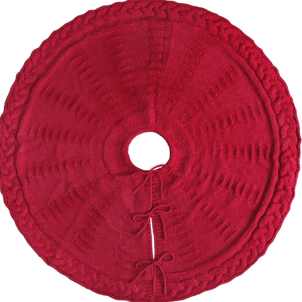 Red knitted Christmas tree skirt with 122cm diameter showing traditional wool construction