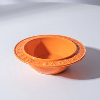 Ceramic cat bowl with iron anti-tip frame in blue colour with silicone pad