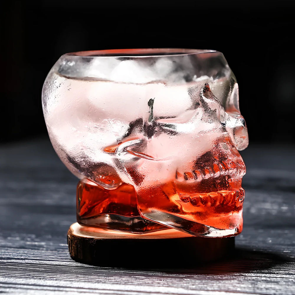 Transparent skull-shaped wine glass with detailed features and 160ml capacity measurement