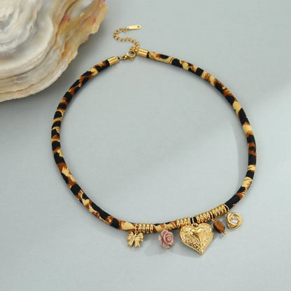 Women's stainless steel necklace with geometric leopard pendant and gold electroplated chain
