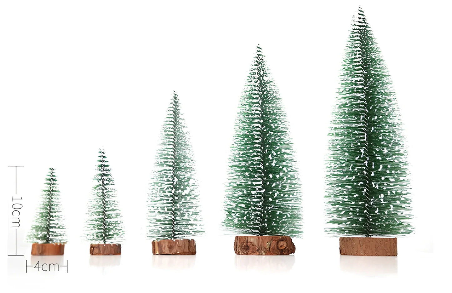 Mini Christmas tree with white snow flocking on green PVC branches, tabletop decoration