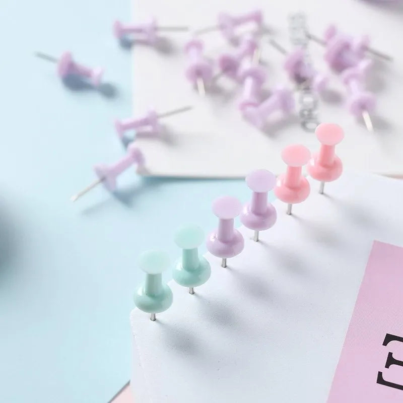 Macaron colour plastic push pins in cherry blossom pink, mint green and lavender, available in large and small sizes