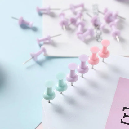 Macaron colour plastic push pins in cherry blossom pink, mint green and lavender, available in large and small sizes