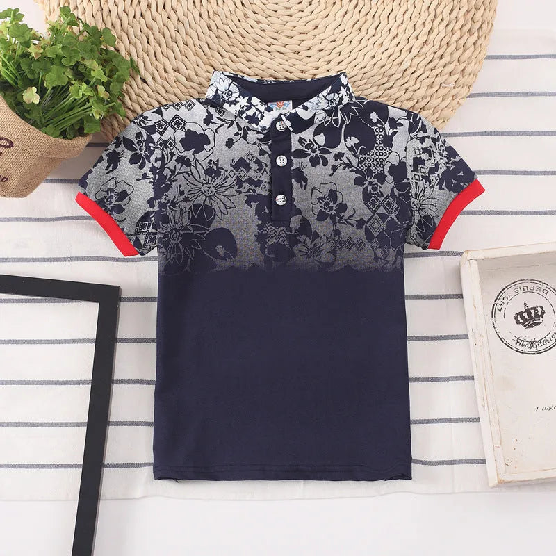 Boys short sleeve cotton lapel shirt in solid colour on a hanger.