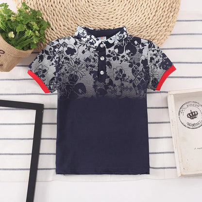 Boys short sleeve cotton lapel shirt in solid colour on a hanger.