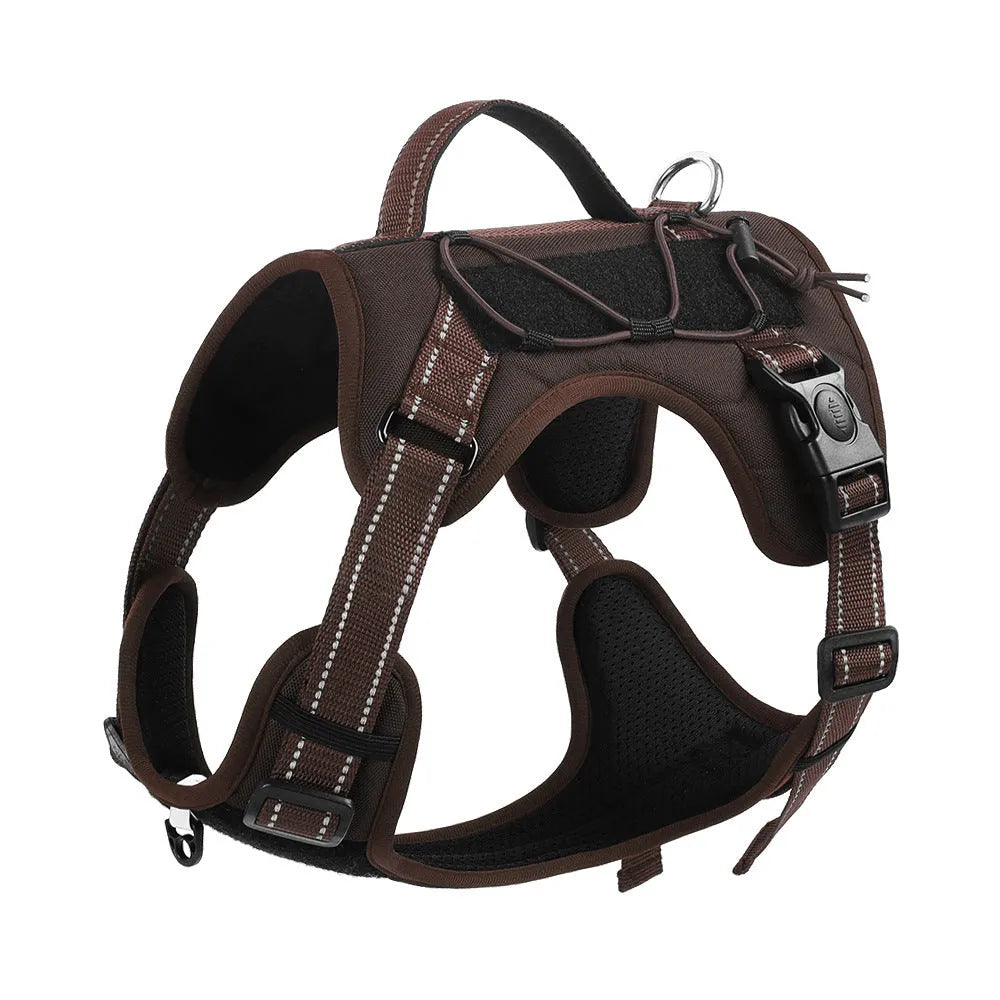 Orange reflective dog harness with attached black hand-holding rope leash shown on a medium-sized dog.