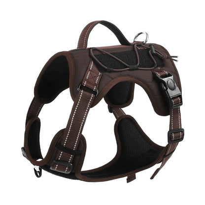 Orange reflective dog harness with attached black hand-holding rope leash shown on a medium-sized dog.