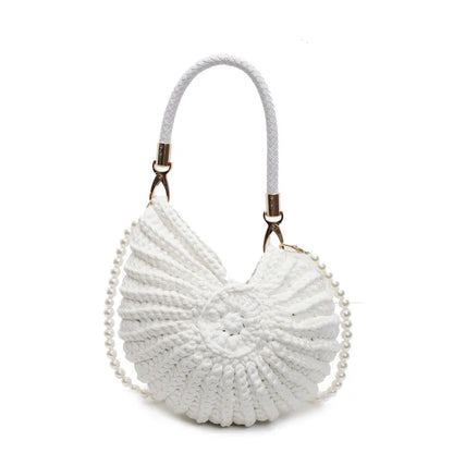 Handmade woven cloth bag with double shoulder straps in shell shape showing open pocket design