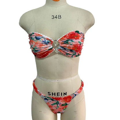 Colourful floral print tube top bikini set with lace trim on a mannequin