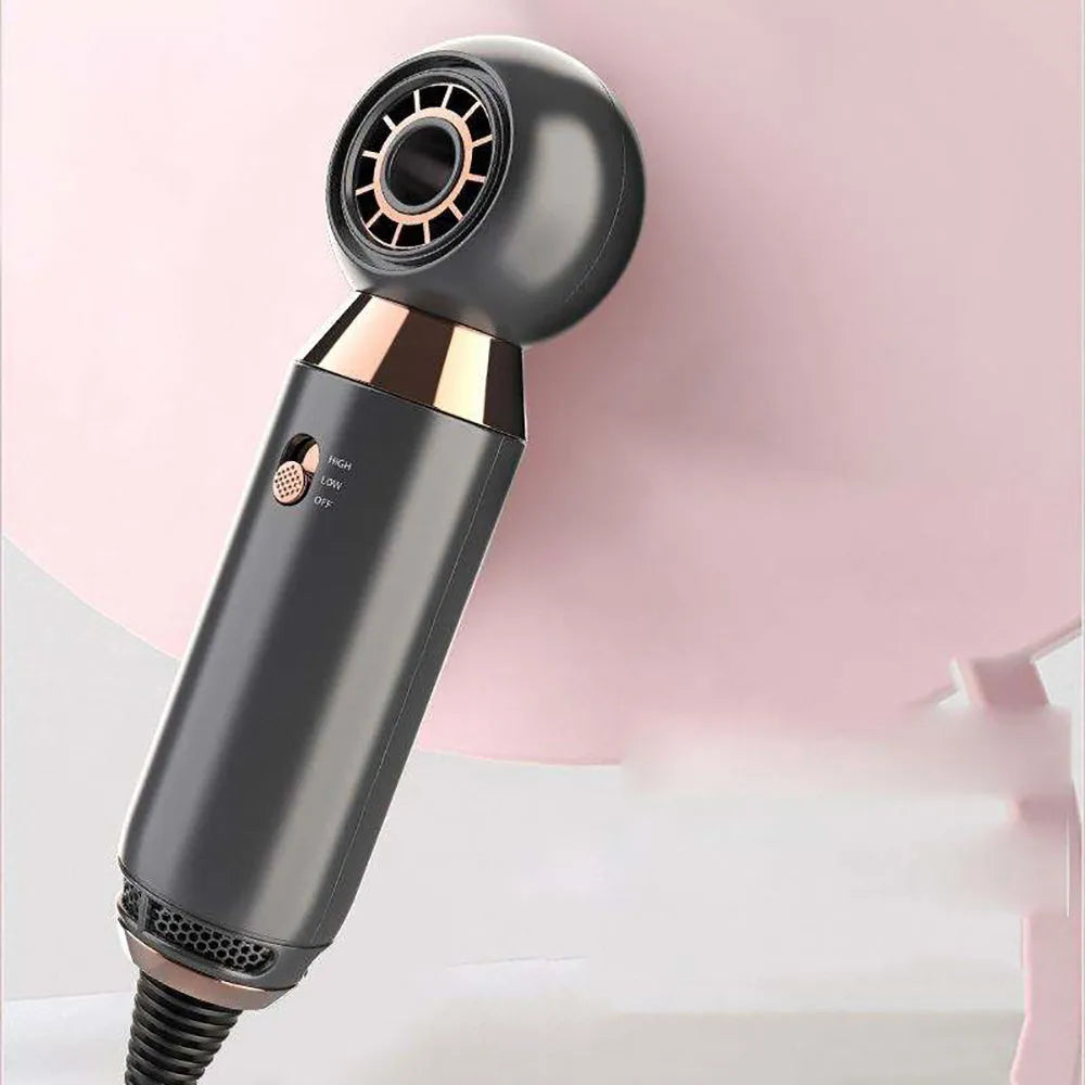 Compact white hair dryer with concentrator attachment showing 800W power rating and two speed settings