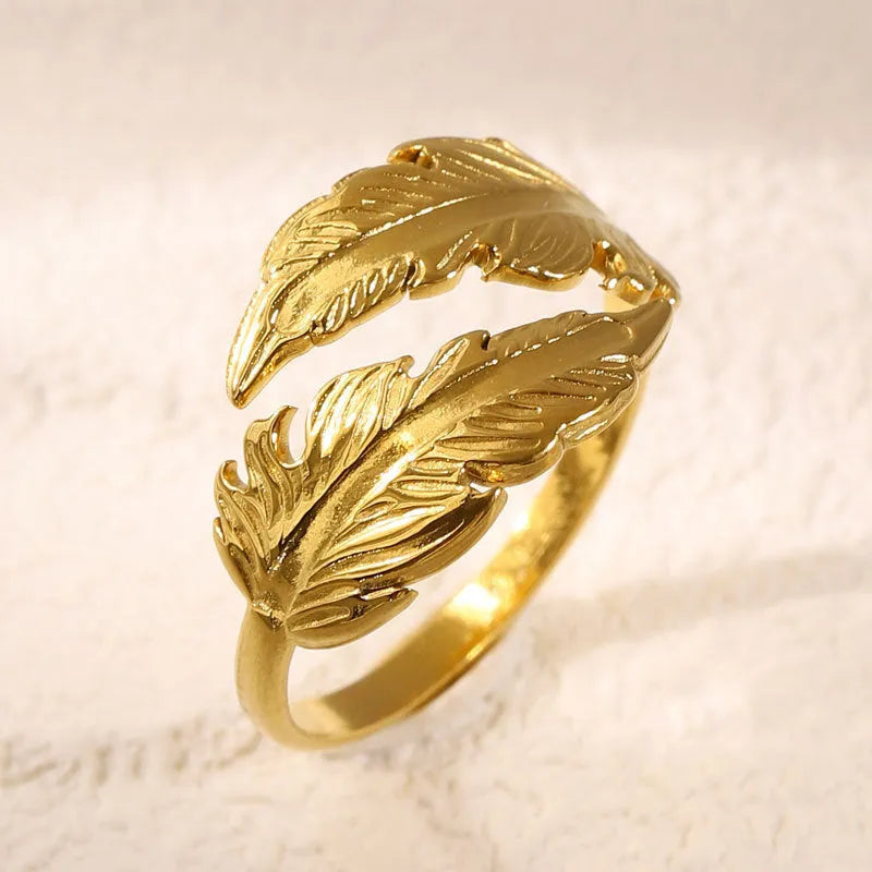 Women's adjustable stainless steel feather ring in gold or silver colour