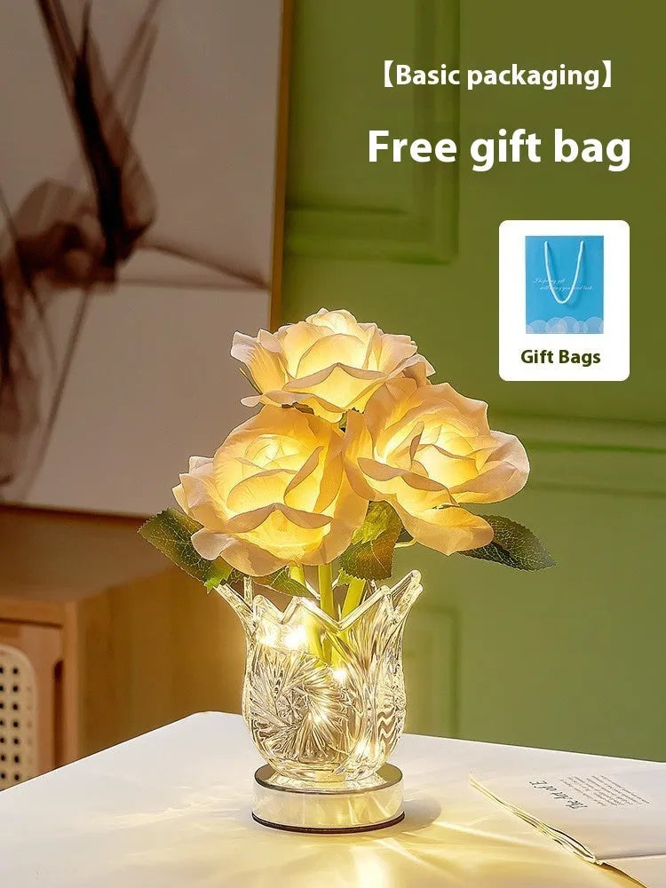 Modern crystal flowers design rechargeable touch table lamp with dimming control on a bedside table.