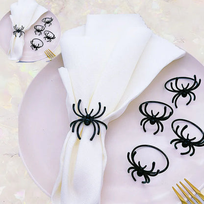 Six black spider-shaped alloy napkin rings with electrophoresis coating for Halloween table settings